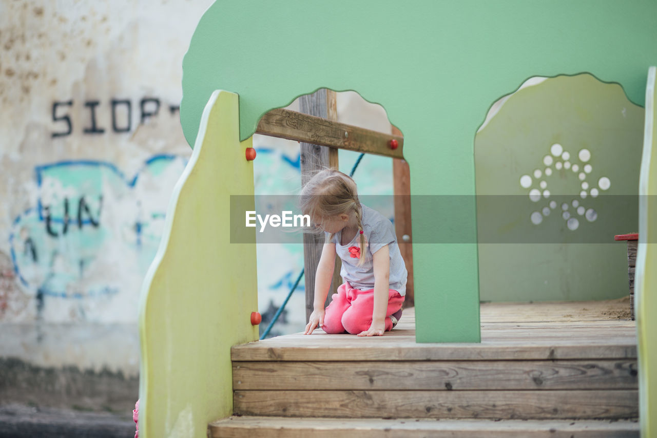 Cute girl playing at playground