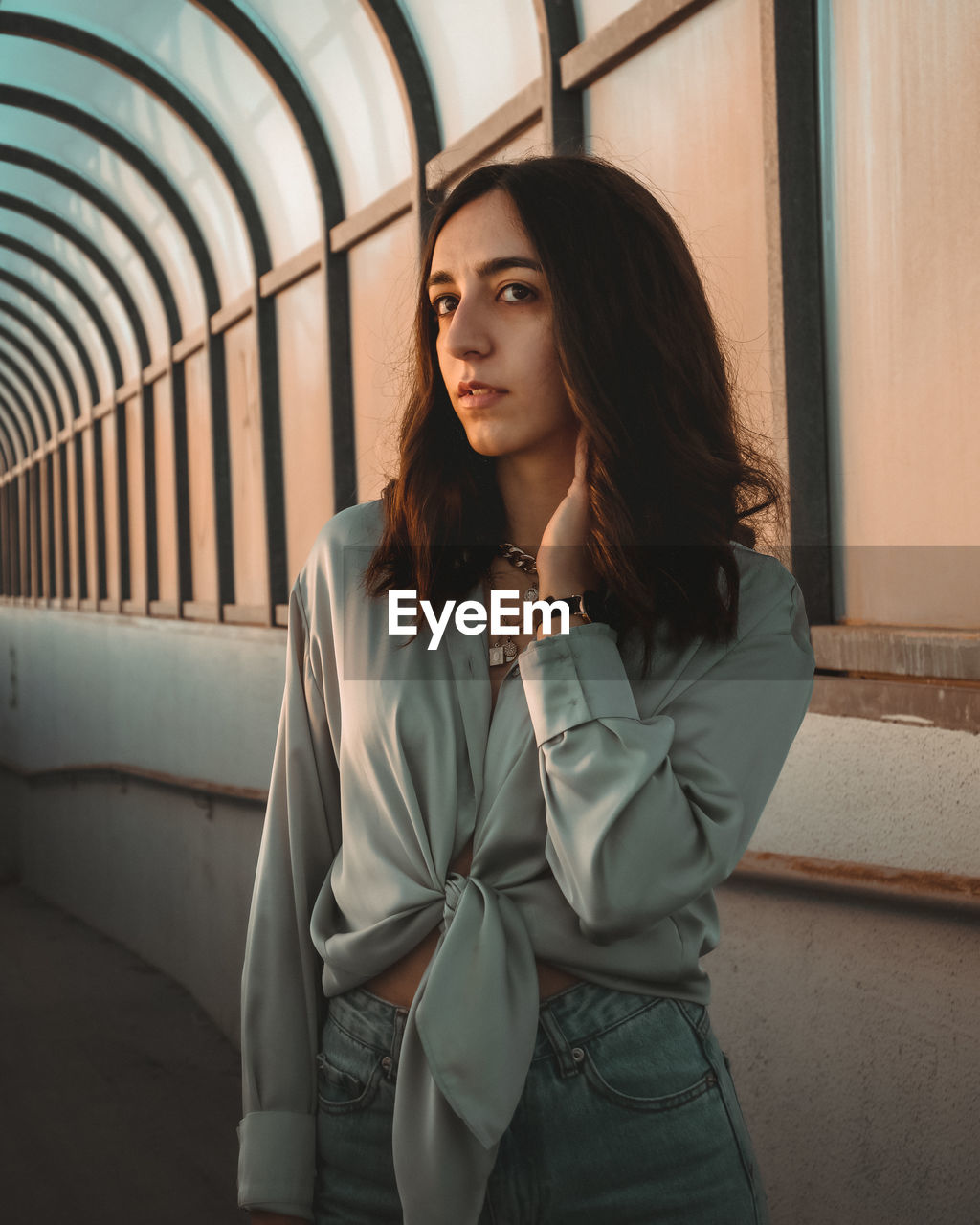 Portrait of beautiful young woman looking away