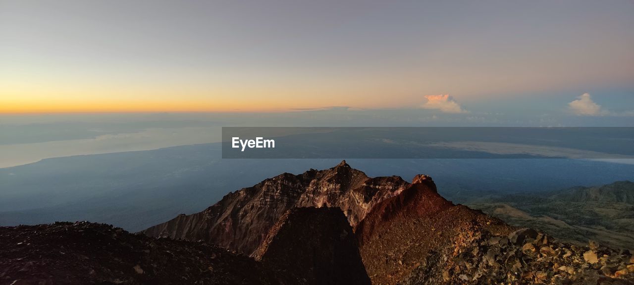 Scenic view from the summit of mt. rinjani during sunrise blue hour