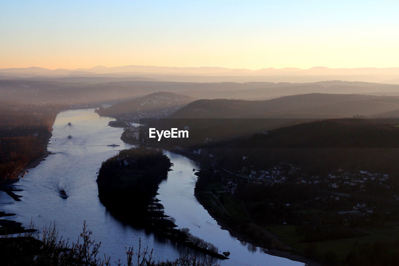 Scenic view of landscape against sky during sunset