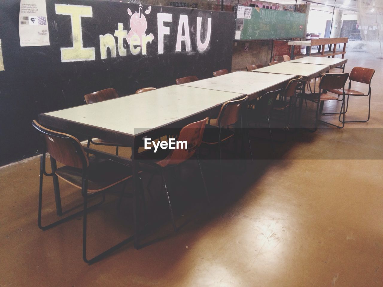 VIEW OF EMPTY CHAIRS AND TABLES