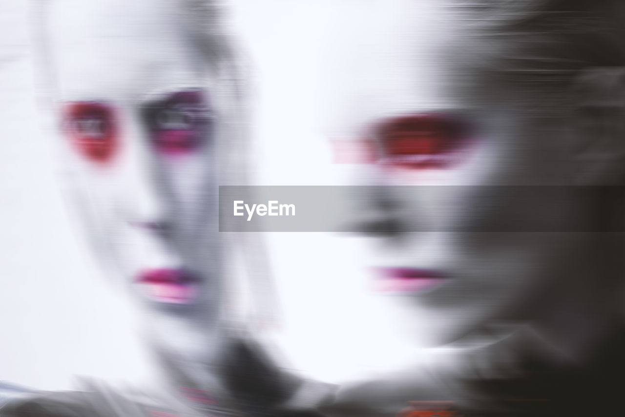 Blurred motion of woman with eye make-up
