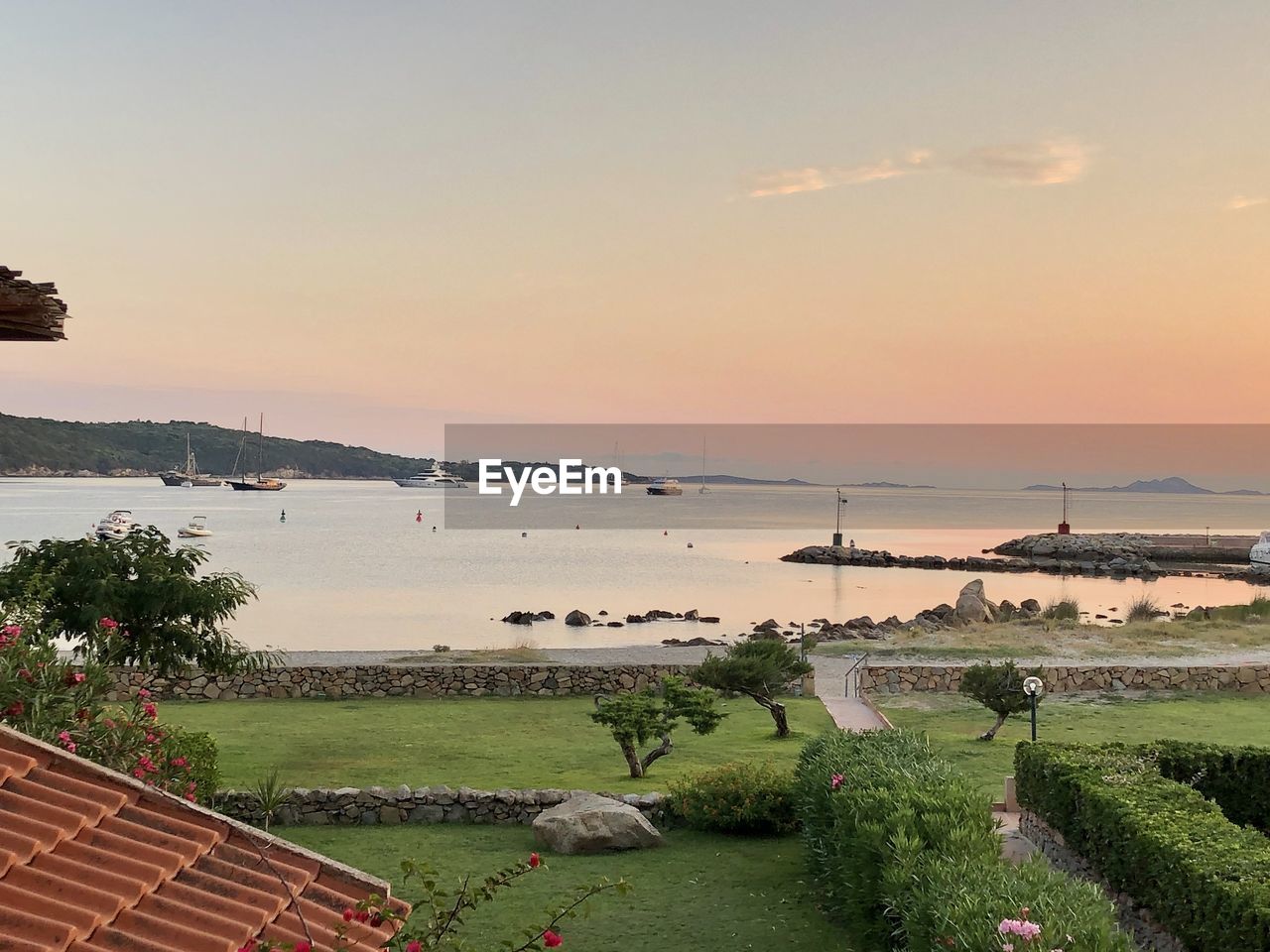 SCENIC VIEW OF SEA DURING SUNSET