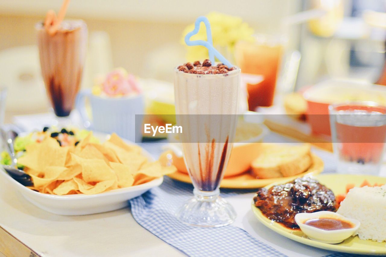 Close-up of fruits served in plate on table