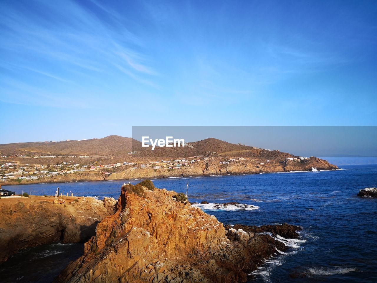 SCENIC VIEW OF SEA AND ROCK FORMATION AGAINST SKY