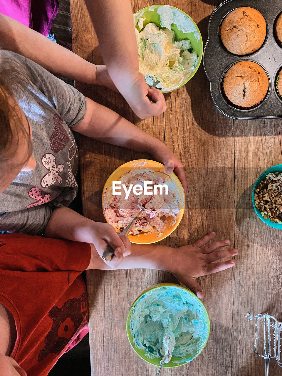 Directly above shot of kids preparing food on table