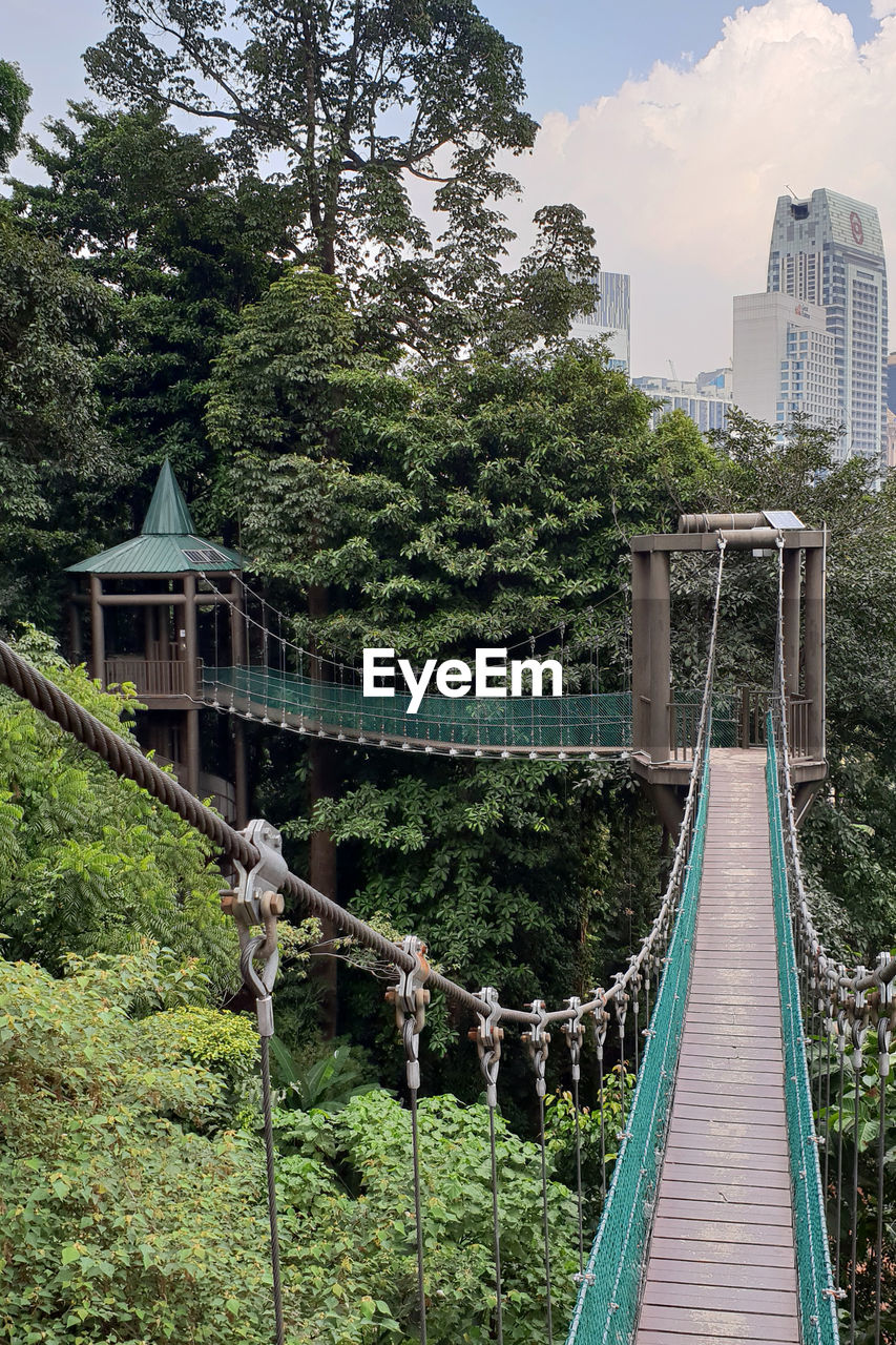 Kuala lumpur, malaysia. feb 7, 2019 - suspension or hanging bridge in front of kl tower. 