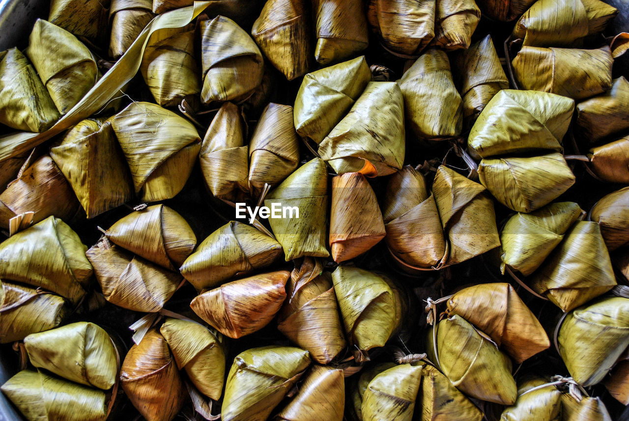 Sticky rice covered in banana leaf