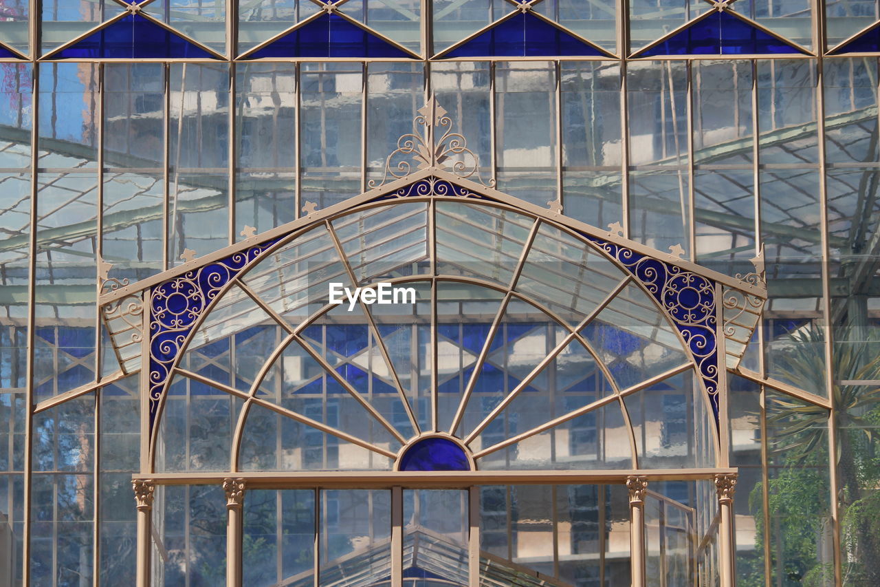 Low angle view of glass house