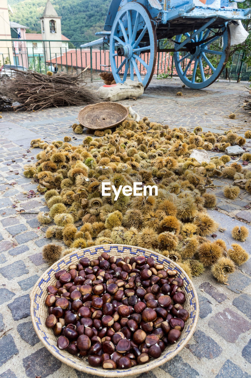 HIGH ANGLE VIEW OF FRUITS ON STREET