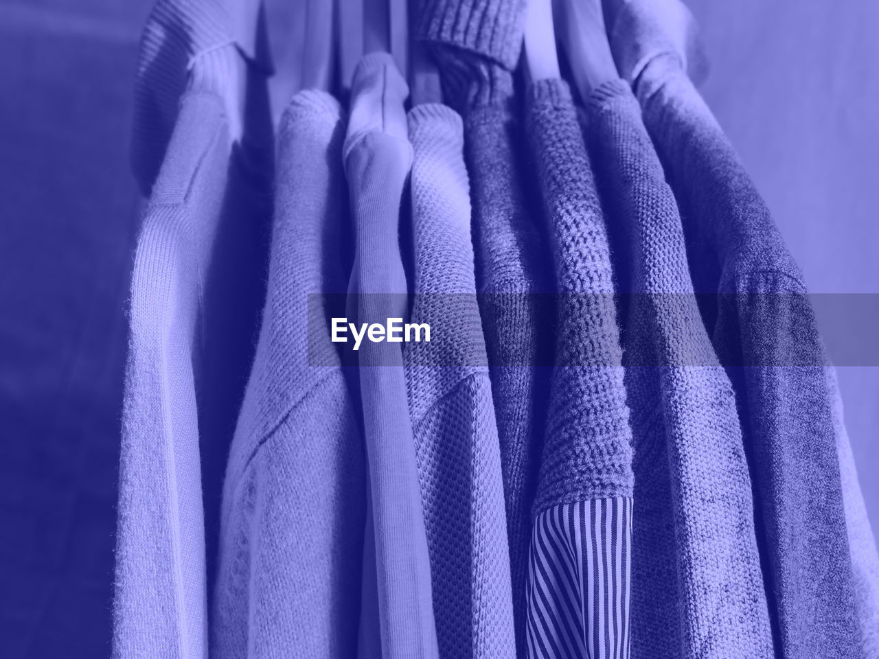 blue, azure, clothing, purple, textile, hanging, indoors, no people, cobalt blue, close-up, fashion, electric blue, fashion accessory, coathanger, studio shot, retail