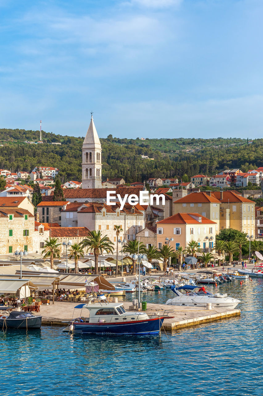 Vertical photo of seaside town of supetar on brac island in croatia