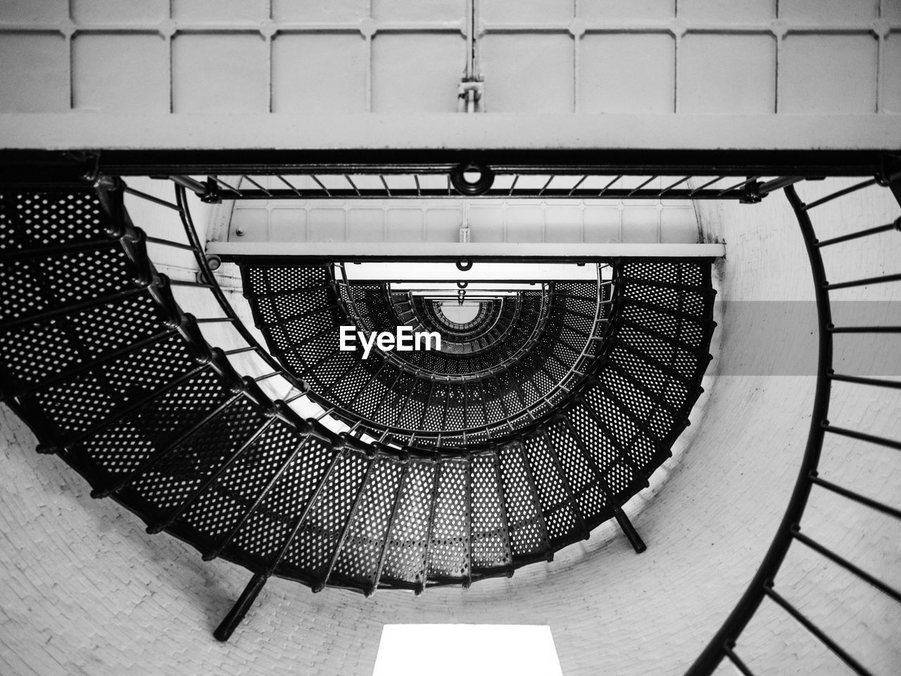 Directly above shot of spiral staircase in building