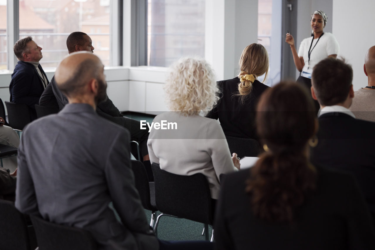 Woman having presentation during business meeting