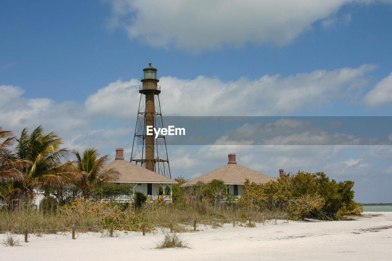 A historic lighthouse for navigation on the beach at sanibel island