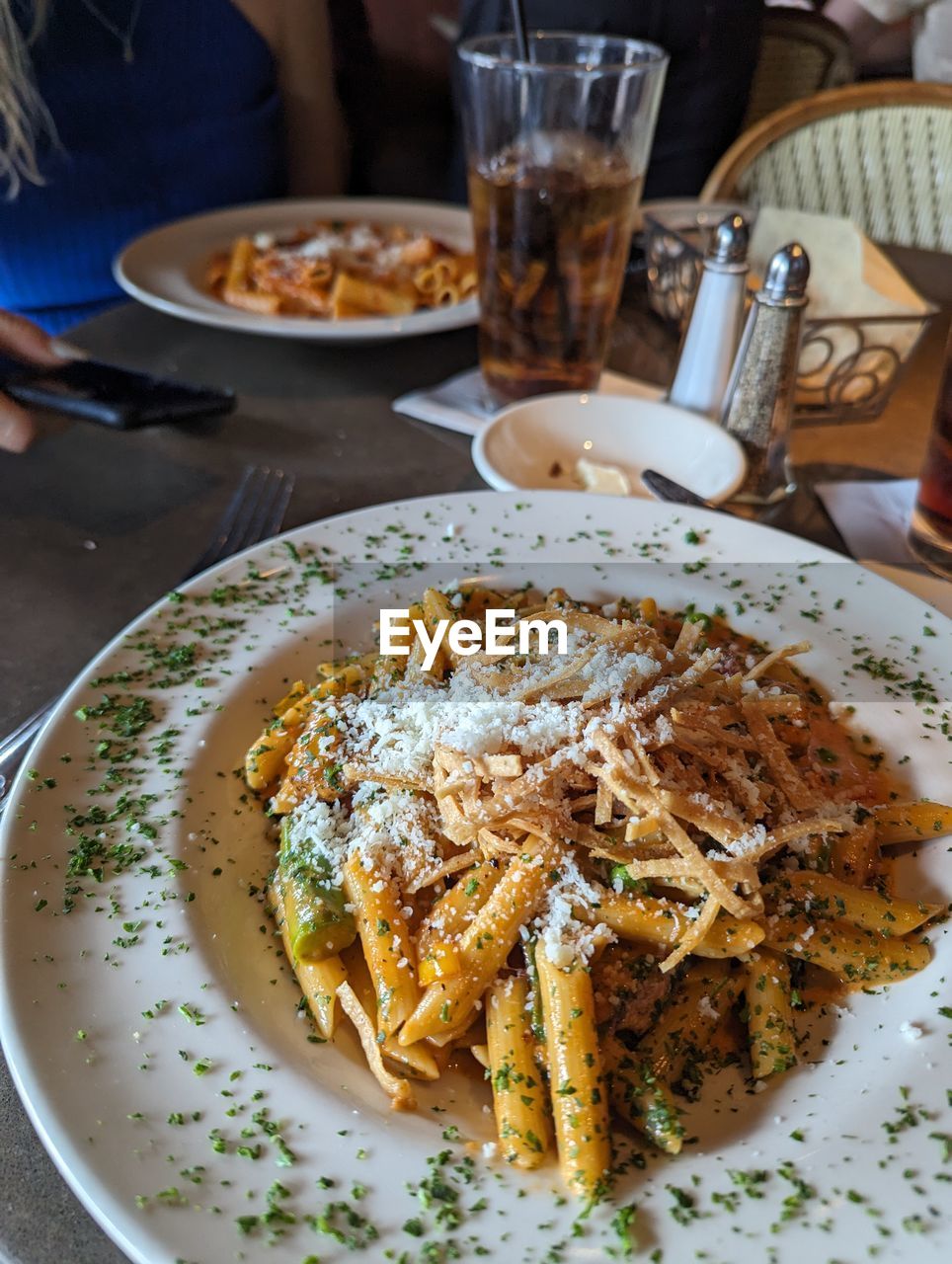 food and drink, food, plate, table, dish, freshness, meal, breakfast, cuisine, fast food, healthy eating, wellbeing, high angle view, drinking glass, indoors, glass, household equipment, drink, restaurant, serving size, pasta, italian food, business, fork, refreshment, dinner, produce, lifestyles, crockery, eating