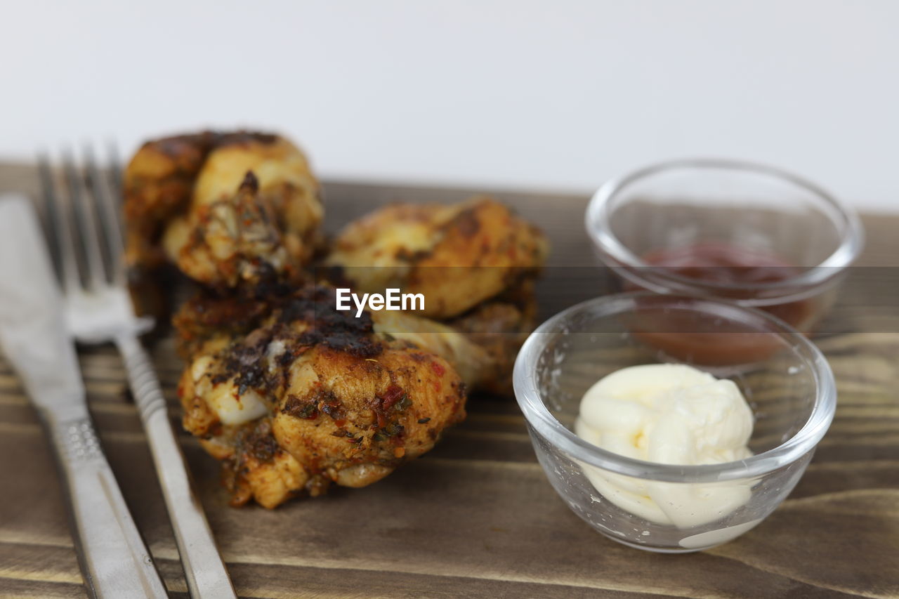 food and drink, food, dish, freshness, produce, healthy eating, breakfast, dessert, meal, wellbeing, indoors, no people, studio shot, fried food, baked, wood, eating utensil, meat, close-up, kitchen utensil, vegetable, cuisine, household equipment, focus on foreground, table, chicken meat