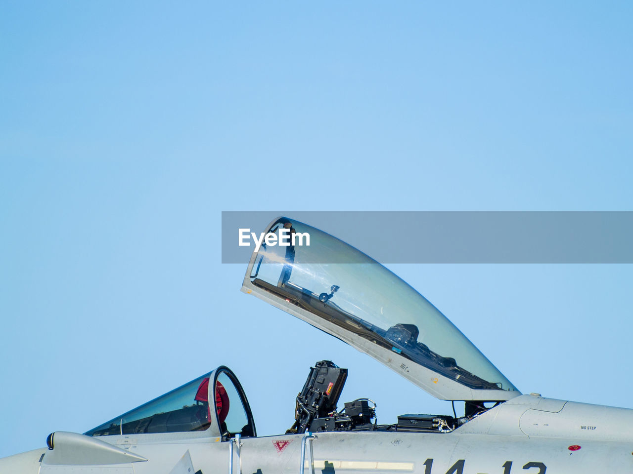 LOW ANGLE VIEW OF AIRPLANE AGAINST SKY