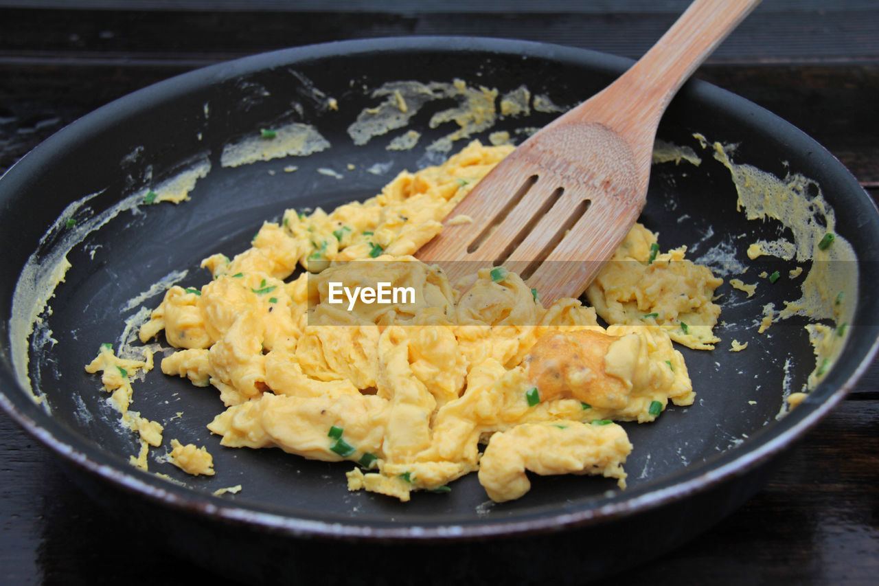 High angle view of scrambled egg in frying pan