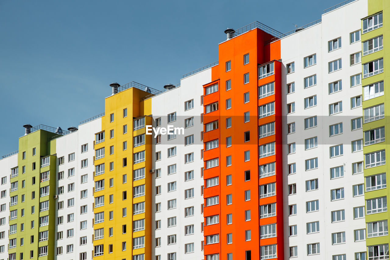 low angle view of building against clear blue sky