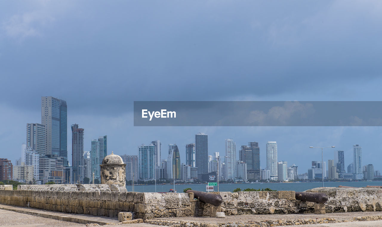 Skyline of cartagena with the ancient city wall in the foreground