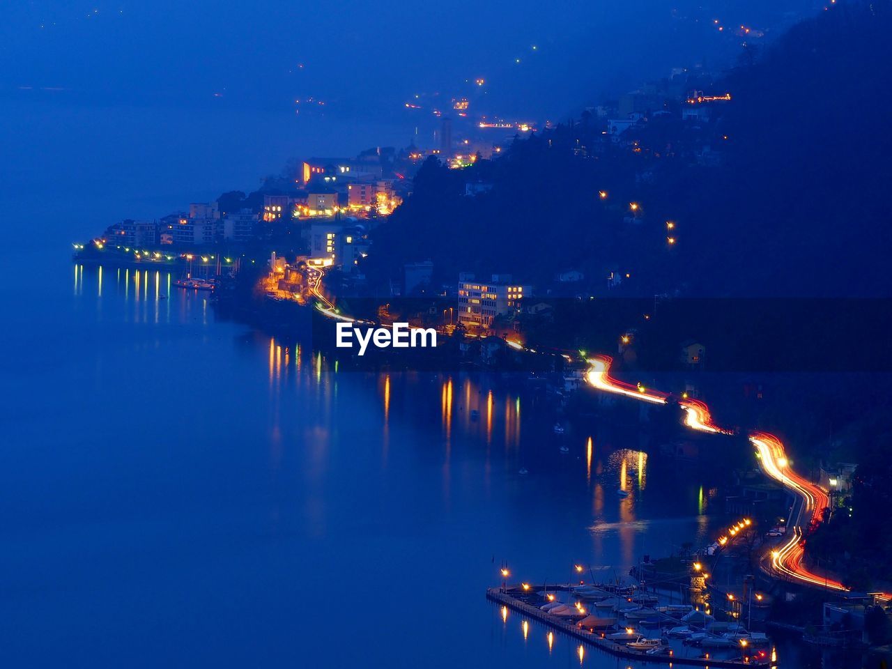 Aerial view of illuminated city at night