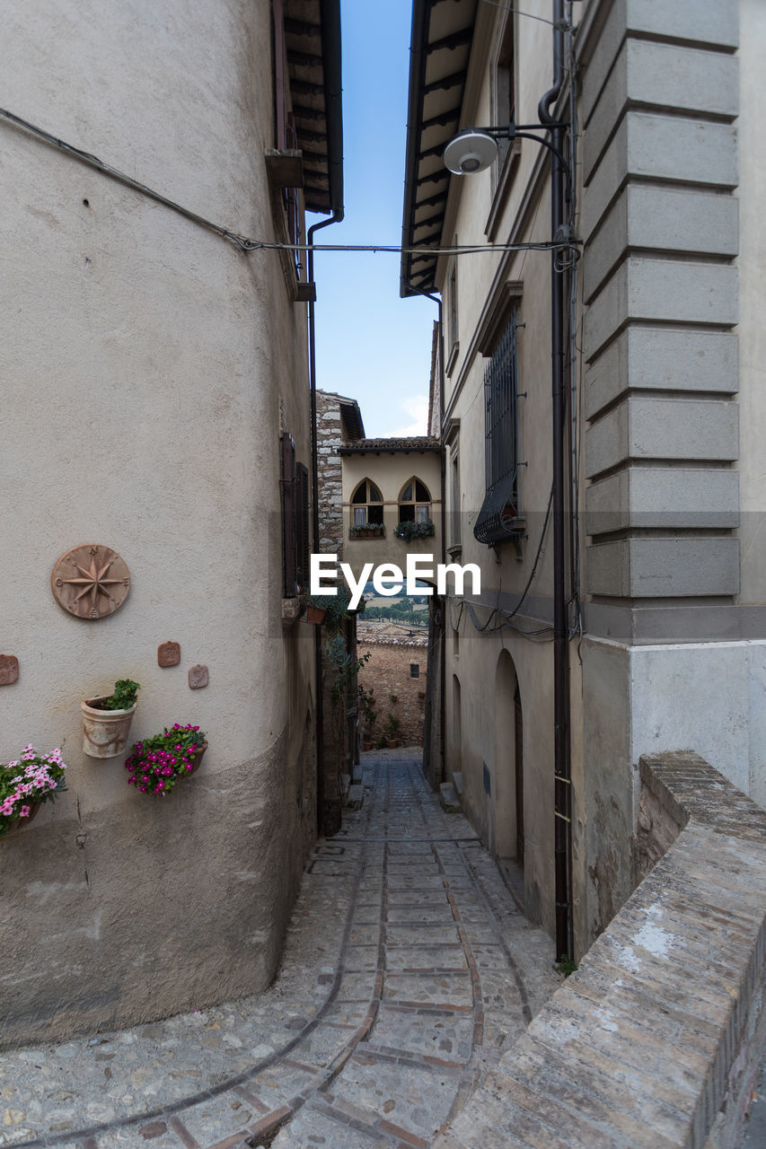 NARROW ALLEY ALONG BUILDINGS