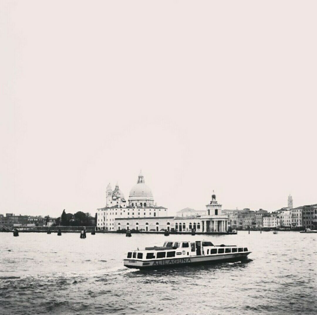 VIEW OF BOATS IN RIVER