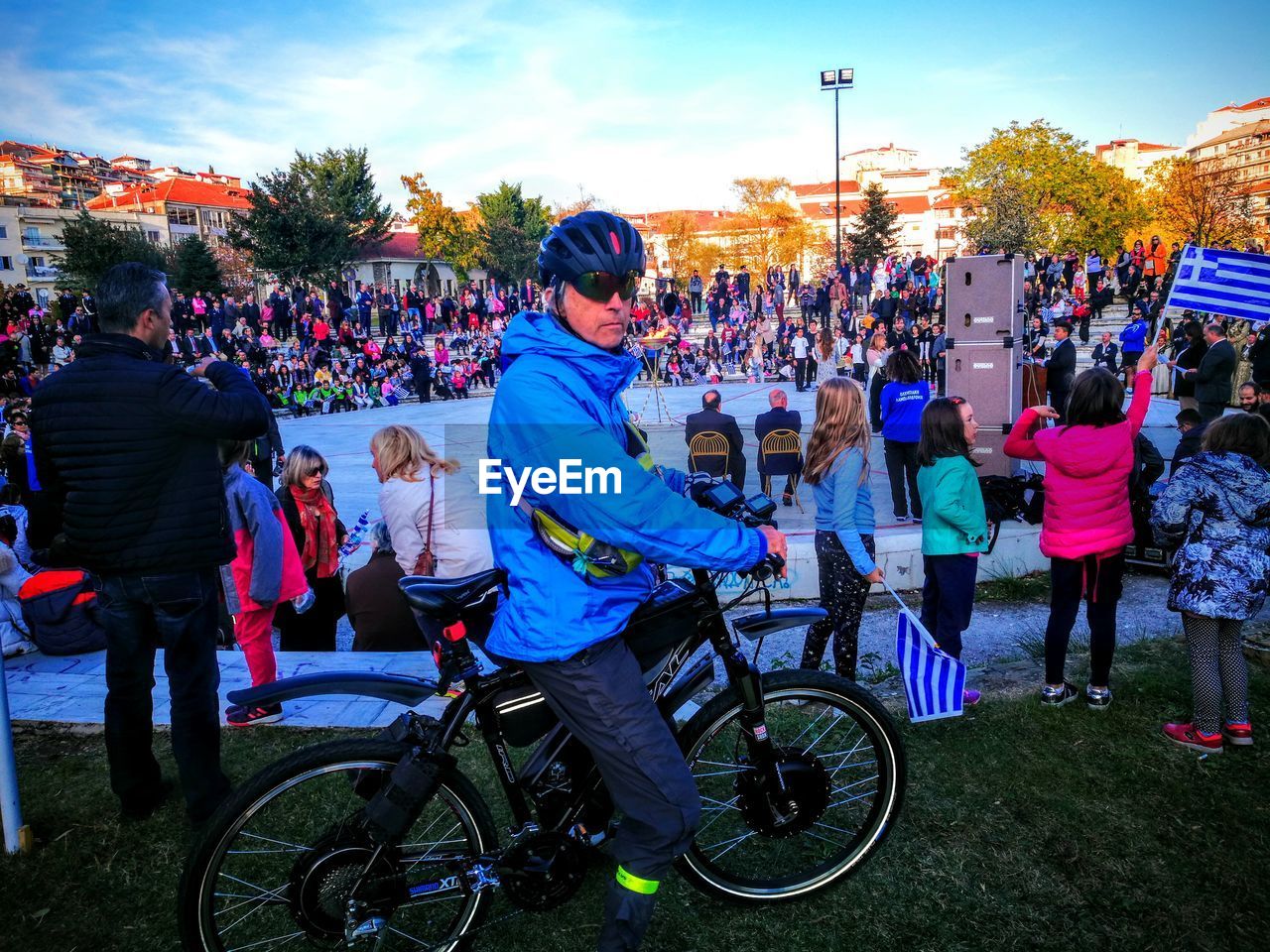 Portrait of man with bicycle against sky