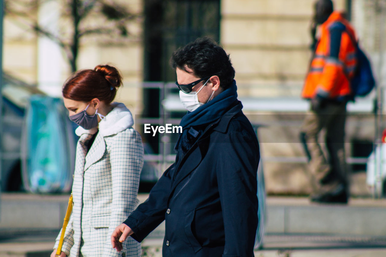 PEOPLE WALKING ON ZEBRA CROSSING