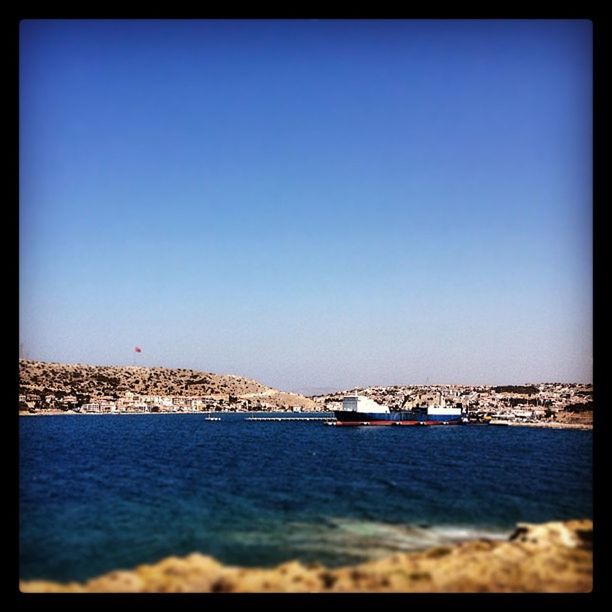 BOATS IN SEA AGAINST CLEAR SKY