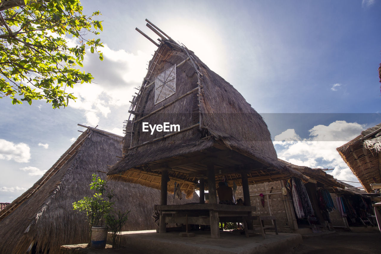 The granary at traditional sade village, lombok. low angle view of traditional building against sky