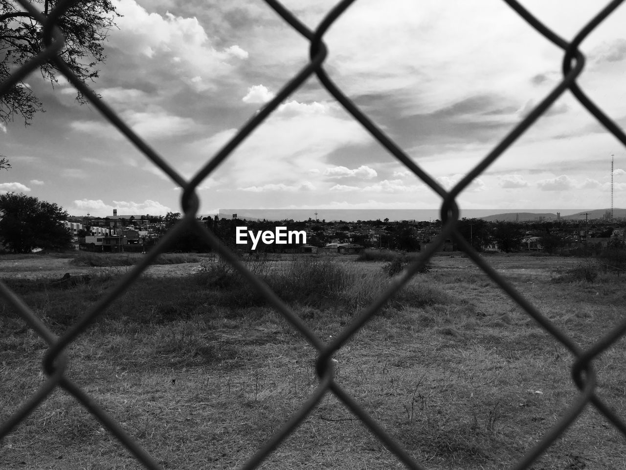 CHAINLINK FENCE AGAINST SKY