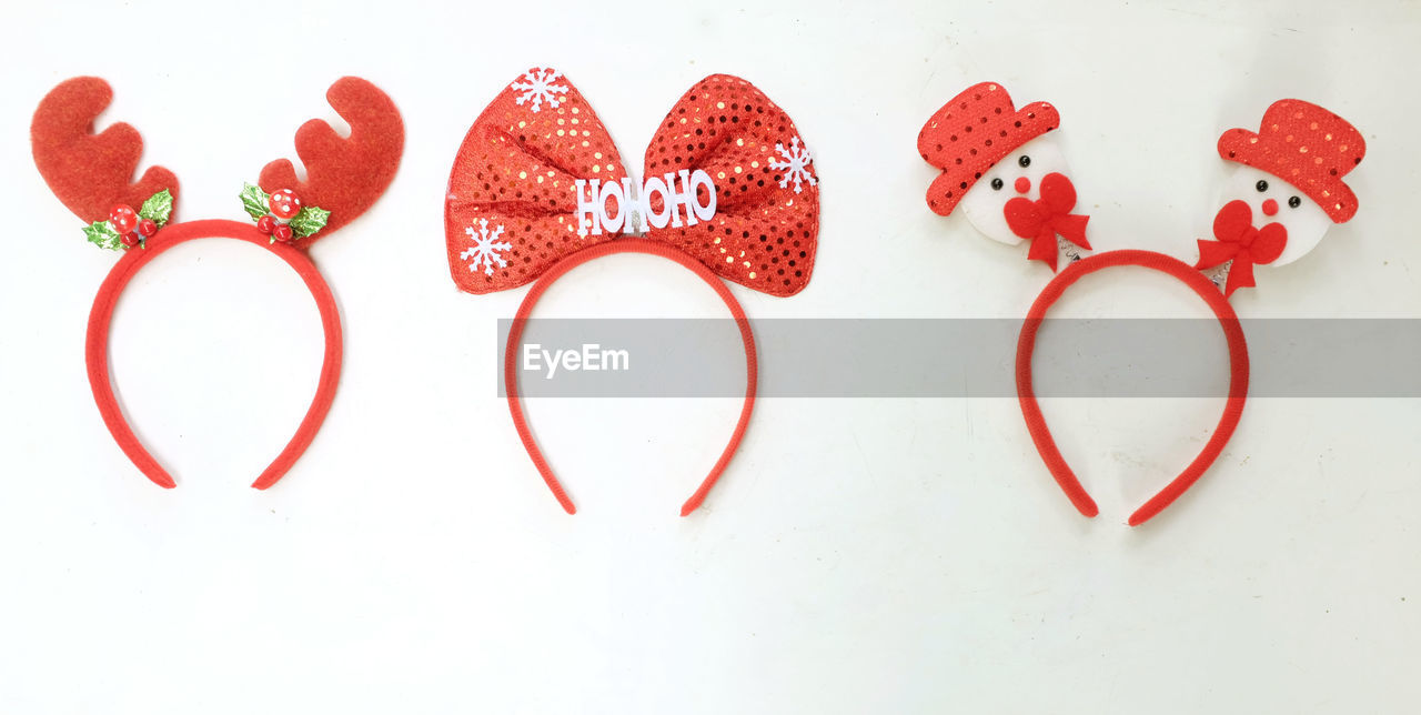 A collection of stylish christmas headphones ,cute christmas headbands  isolate on a white backdrop