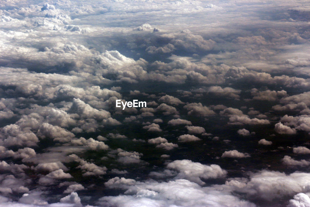 AERIAL VIEW OF DRAMATIC SKY OVER LANDSCAPE