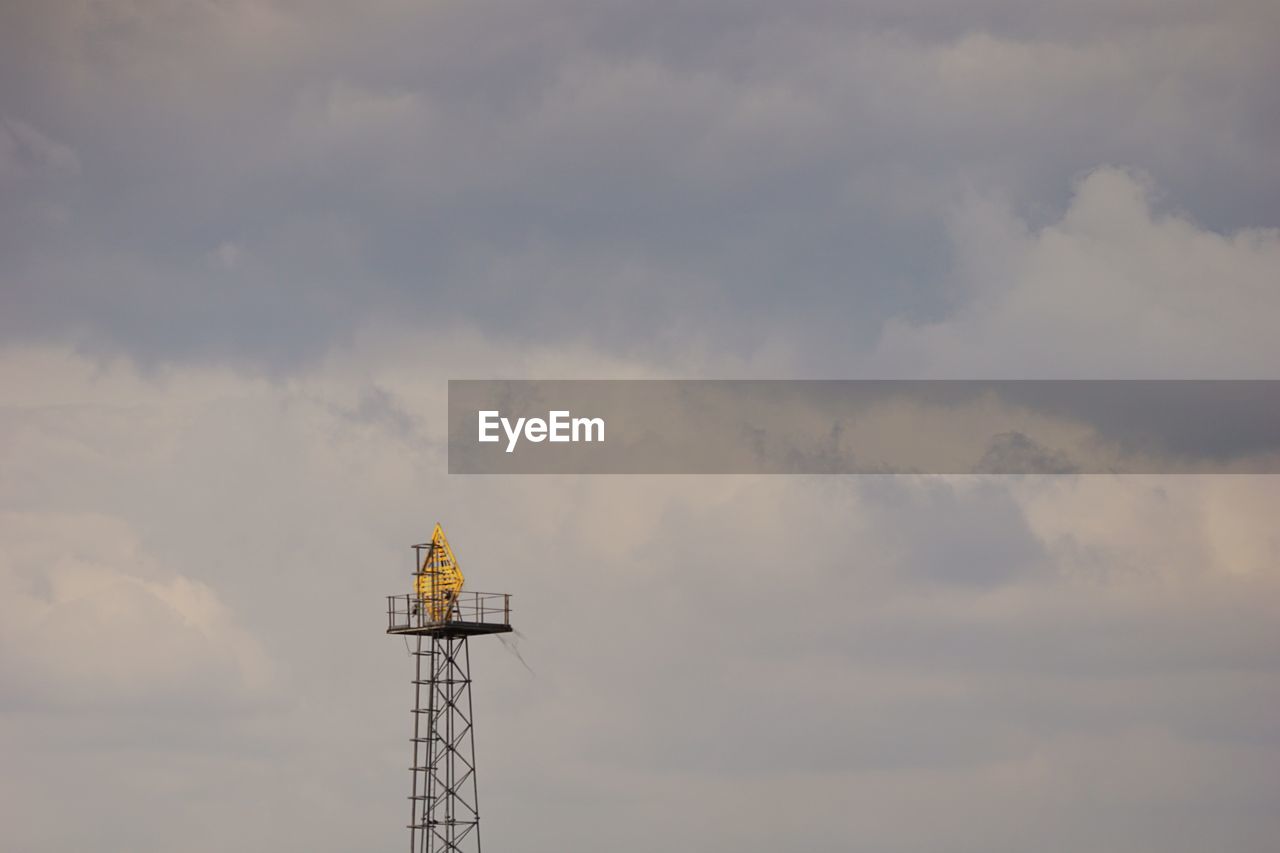 Low angle view of lookout tower against sky