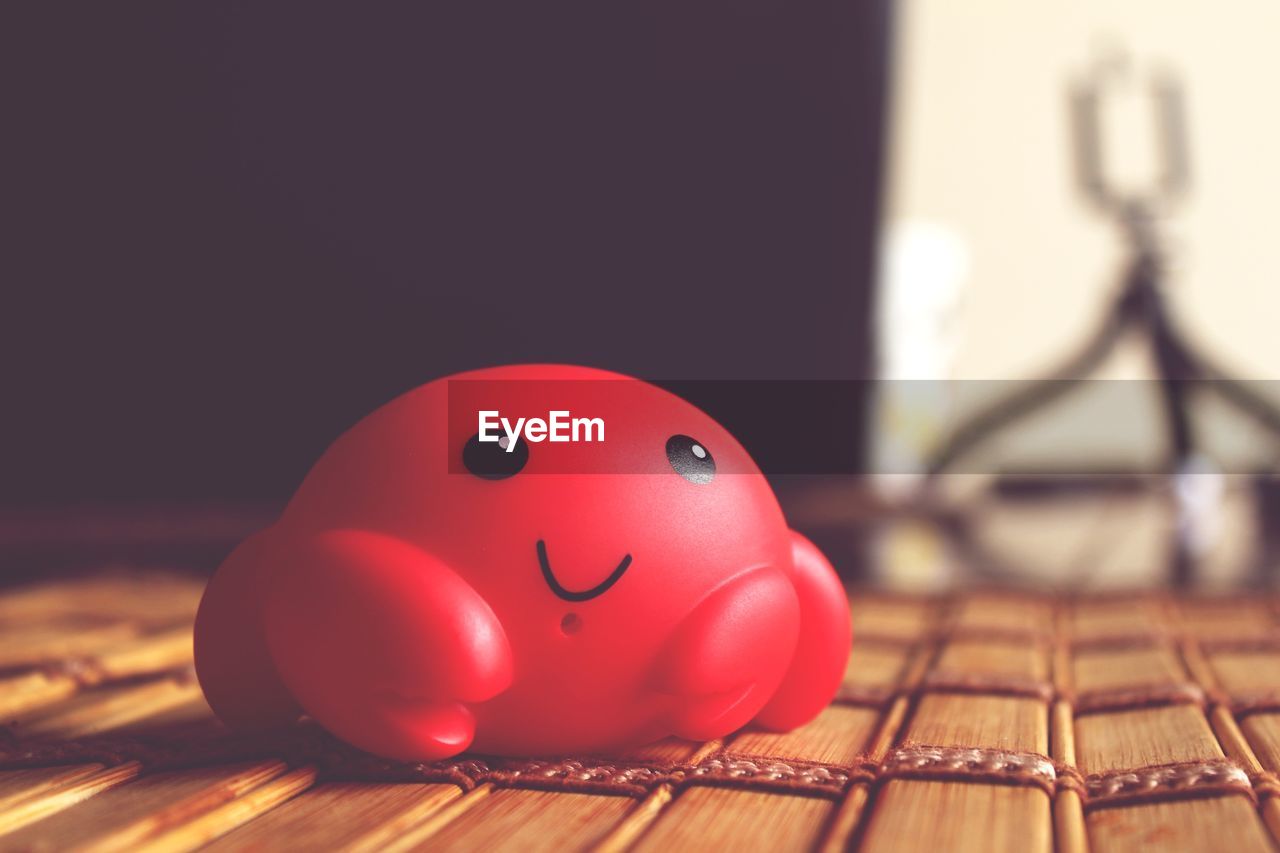 Close-up of red toy on table