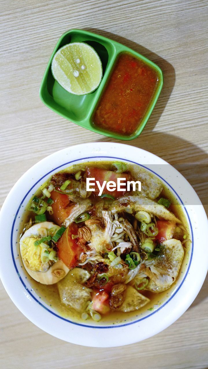 High angle view of soup served on table