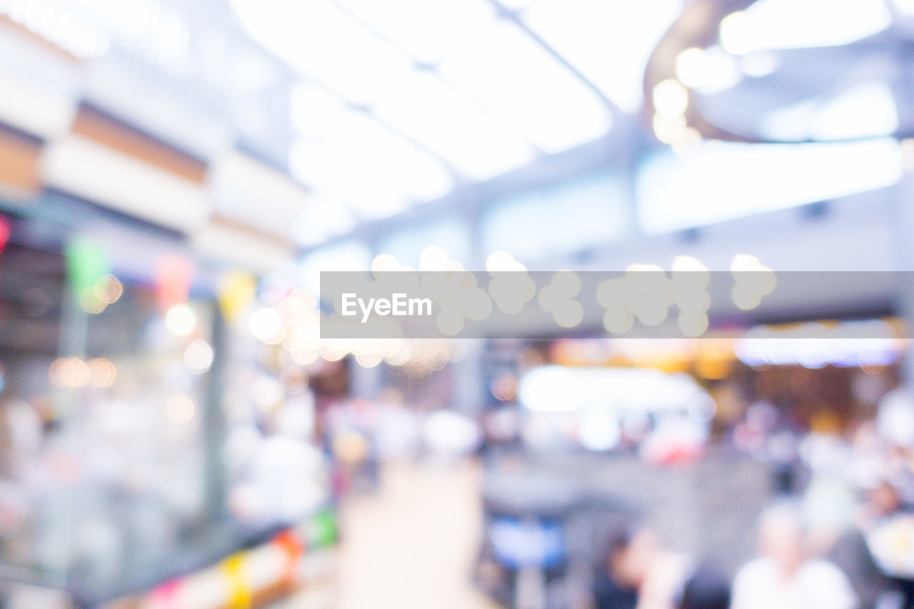 Defocused image of illuminated shopping mall