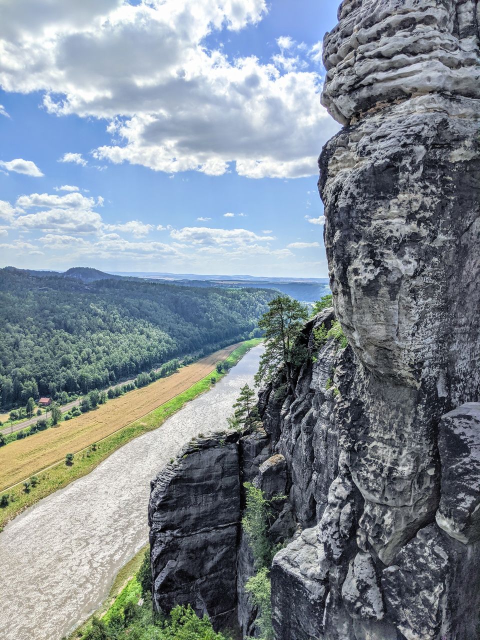 ROCK FORMATIONS ON LANDSCAPE AGAINST SKY