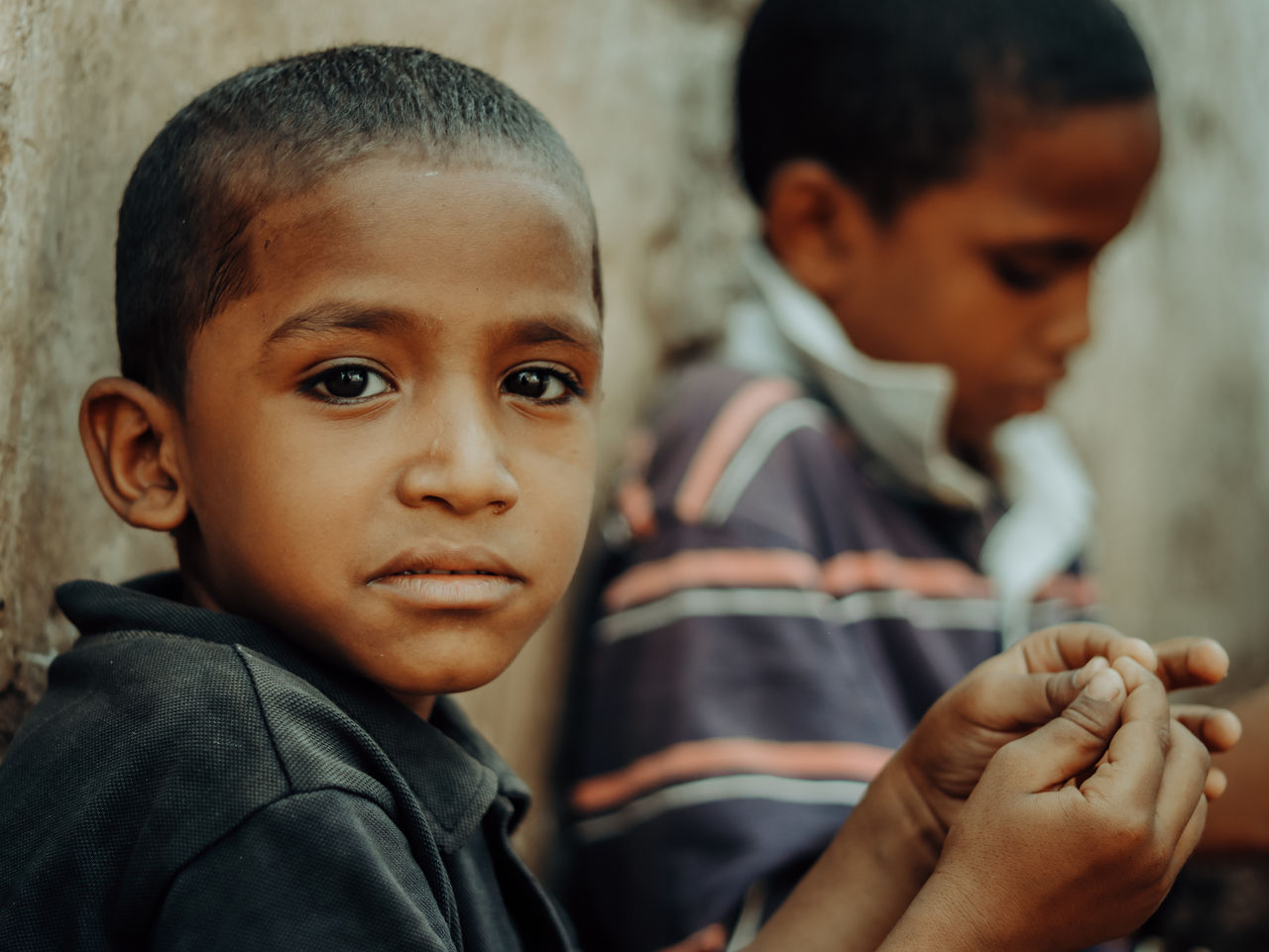 child, childhood, men, person, poverty, emotion, two people, portrait, togetherness, female, baby, toddler, cute, human face, begging, homelessness, family, lifestyles, charity and relief work, women, friendship, positive emotion, adult, lap dog, sadness, social issues, indoors