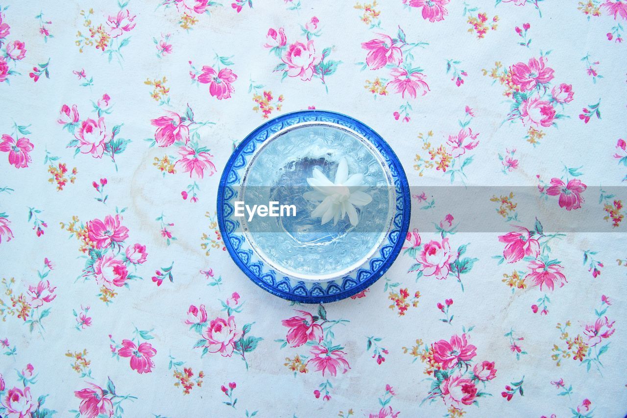 High angle view of white flower in water on table