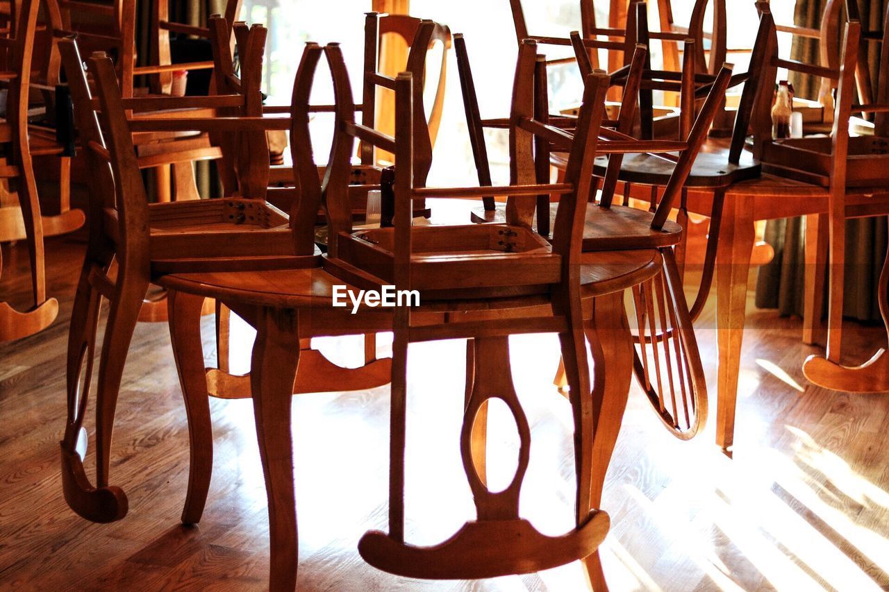 Close-up of chairs on table at restaurant