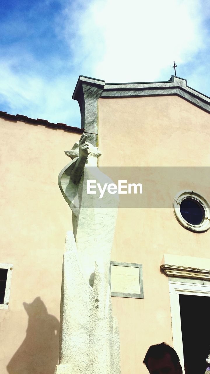 Statue and church