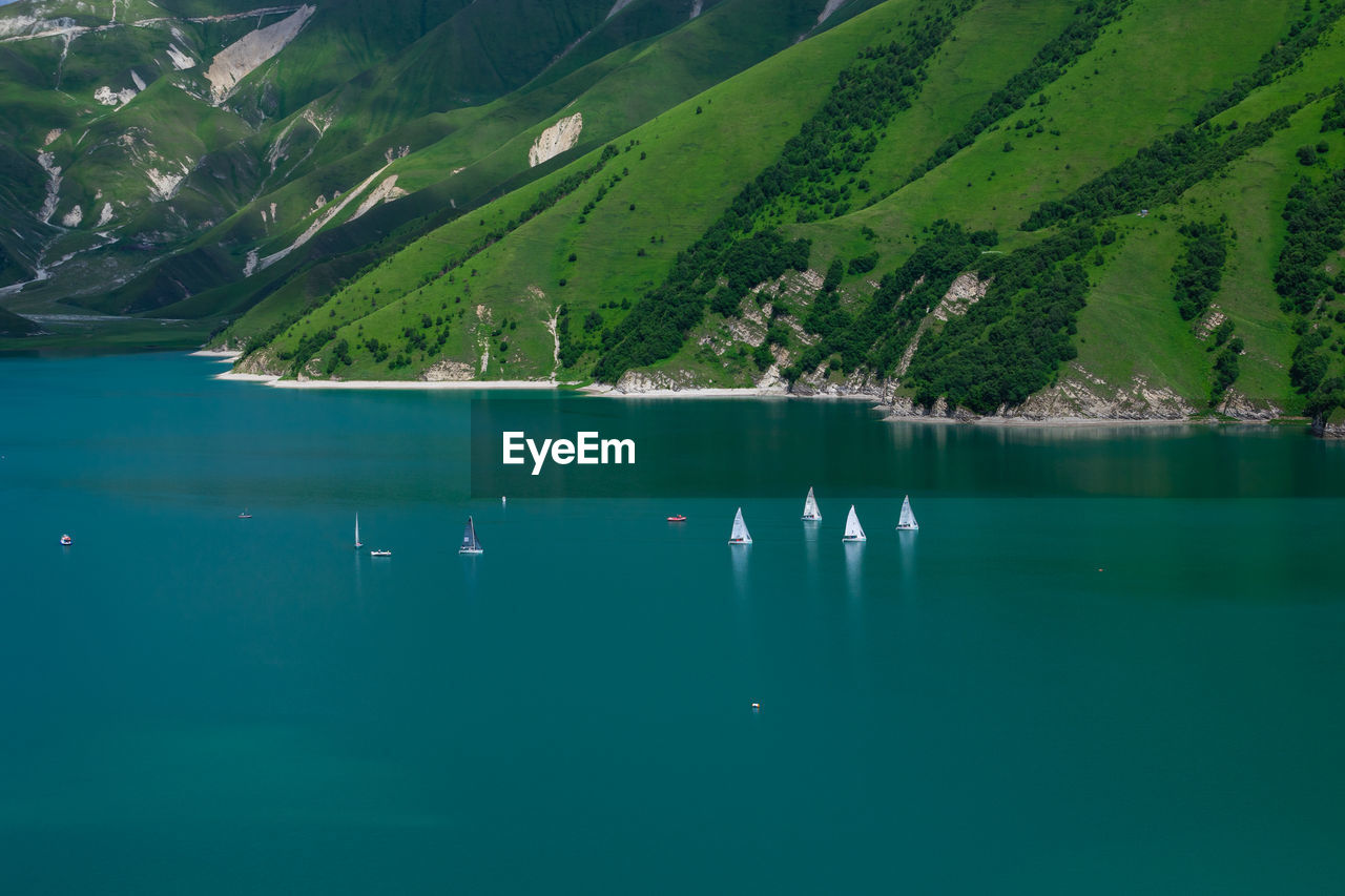 SCENIC VIEW OF LAKE AGAINST TREES