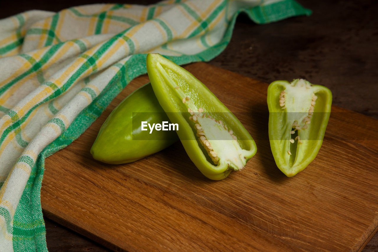 high angle view of green peas on cutting board