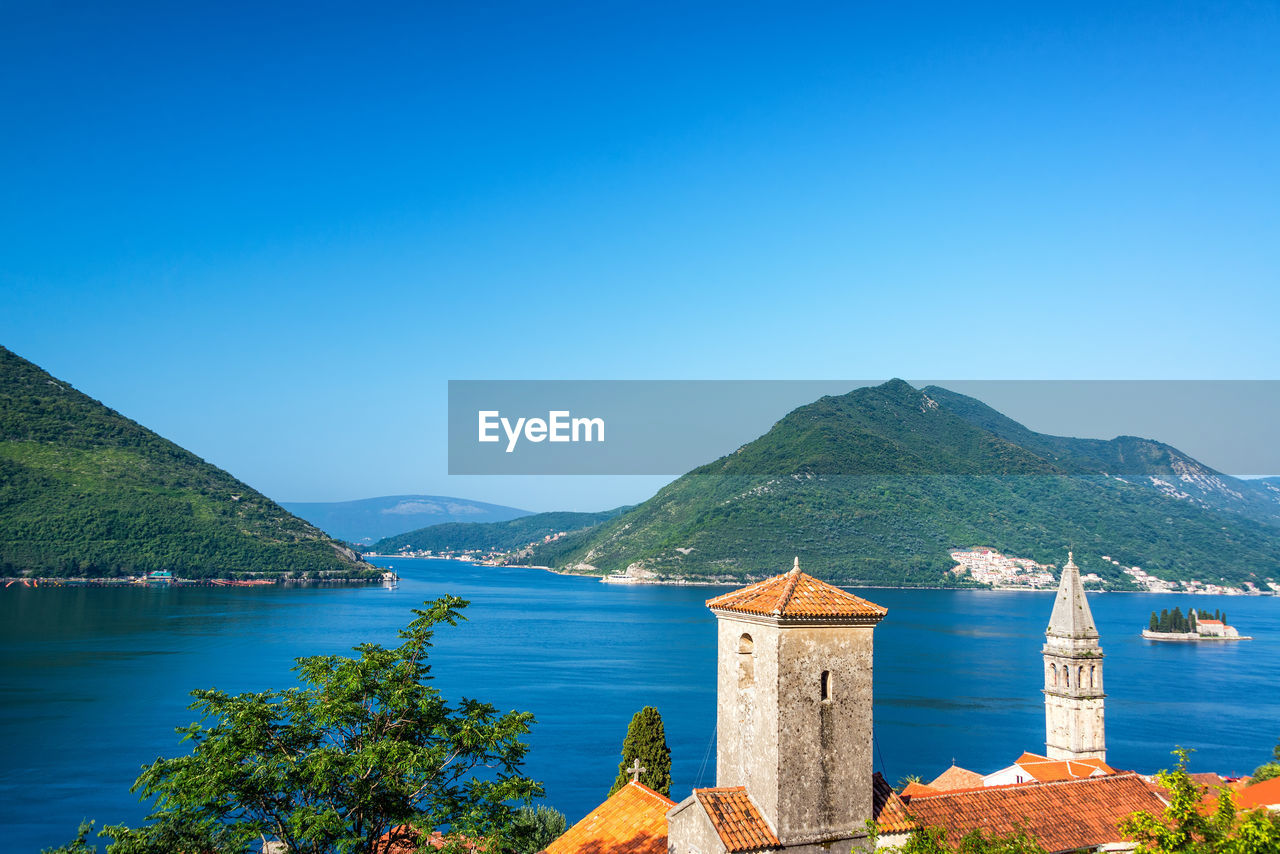 Scenic view of sea against clear blue sky