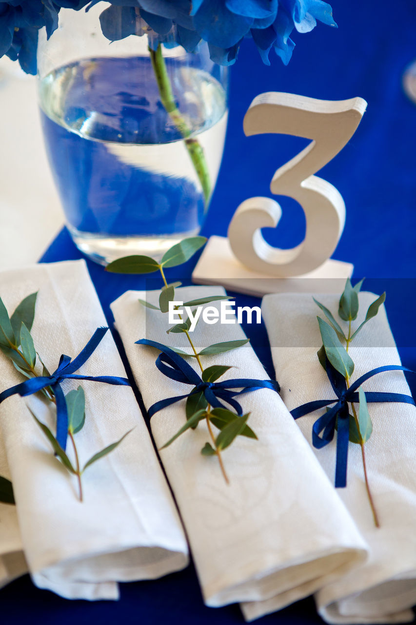 Wedding blue decorations on the table and lavender