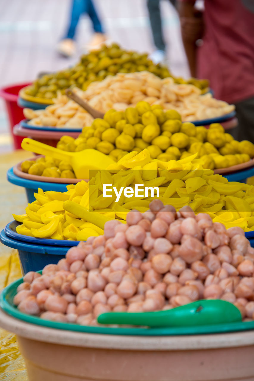 CLOSE-UP OF VARIOUS FRUITS FOR SALE IN MARKET