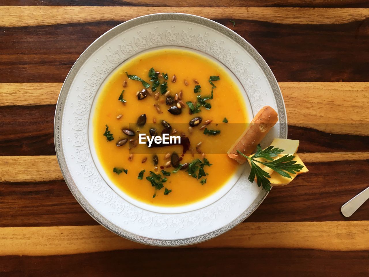 HIGH ANGLE VIEW OF SOUP ON TABLE
